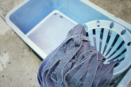 Blue bucket with cleaning mop for cleaningの写真素材