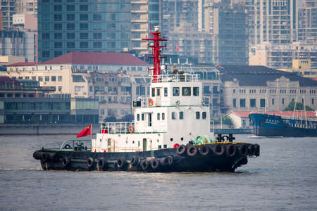 Shanghai Huangpu River tugsのeditorial素材