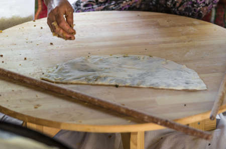 Turkish pancake.Gozleme  is a traditional savory Turkish flatbread and pastry dish, made of hand-rolled leaves of yufkaの写真素材