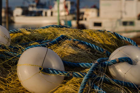 Fishing net in the harbourの写真素材
