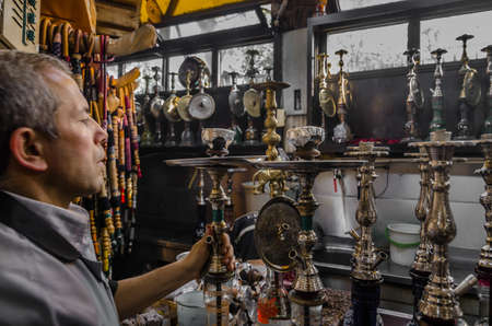 Hookah house near BeyazÄ±t Square, Istanbul. Turkish people smoke hookah (Nargile) in cafeのeditorial素材