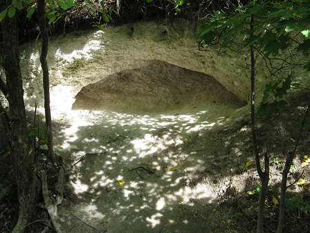 small cave in chalk mountainの写真素材