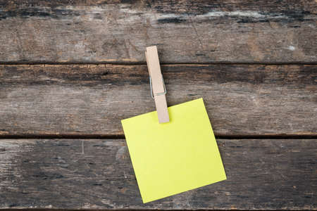 reminder sticky notes on wooden board, empty space for textの写真素材