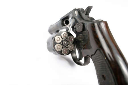 Black revolver gun isolated on white background の写真素材