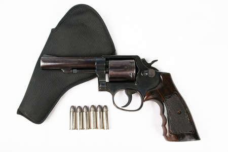 Black revolver gun isolated on white background 