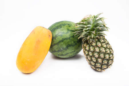 watermelo and pineapple and papaya on white backgroundの写真素材
