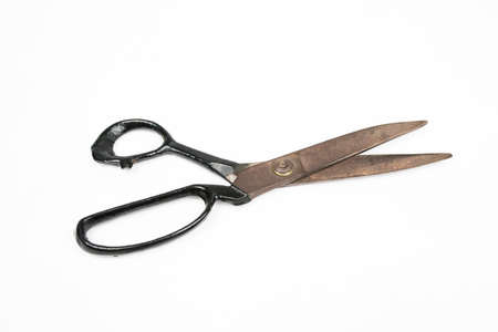 wide open old tailor shears isolated on white background