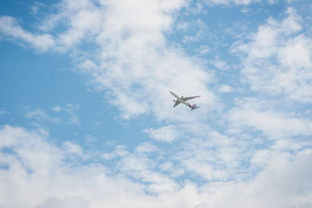 Airplane in the blue skyの写真素材