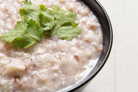 Boiled rice with minced pork and vegetables