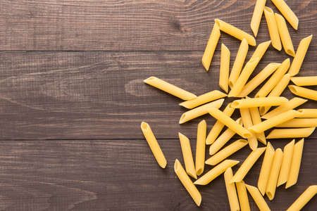 Pasta collection on rustic wooden background.の写真素材