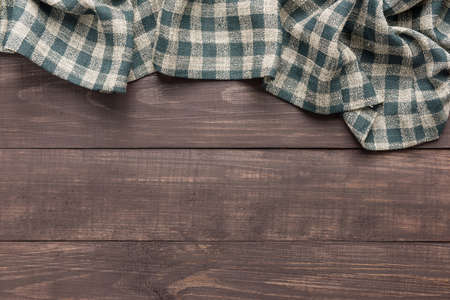 Napkin on the wooden background. Top view.の写真素材