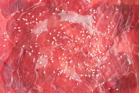 Red meat sliced as a background. Macro shot.の写真素材