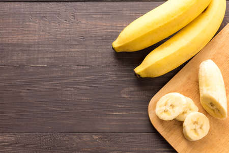 Banana on the wooden background. Top view.の写真素材