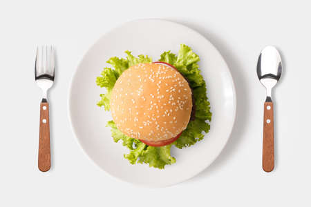 Eating bbq burger on dish isolated on white background. Clipping Path included isolated on white background.の写真素材