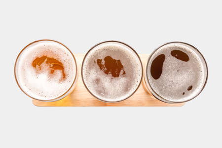 Assortment of beer glasses isolated on white background. Top view. Clipping Path included isolated on white background.