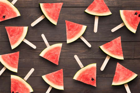 Top view watermelon ice cream on the wooden background.の写真素材