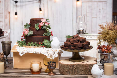 chocolate brownies in stacked on wooden table.の写真素材