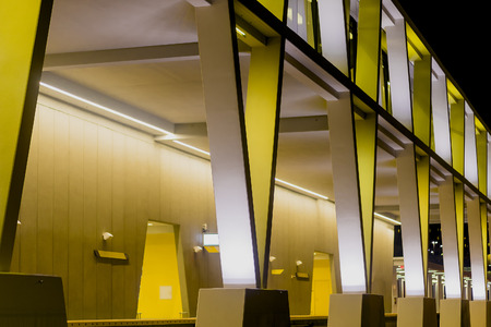 Evening Scene of Modern Bottom Lit Building View From Belowの写真素材