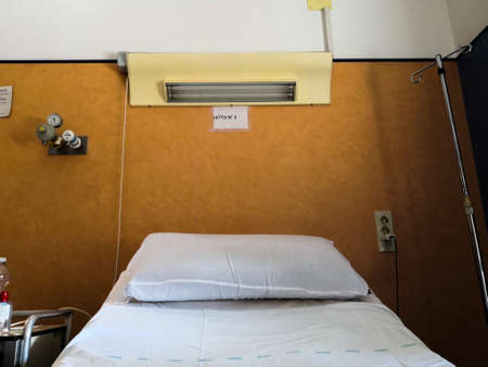 Empty bed in a hospital.