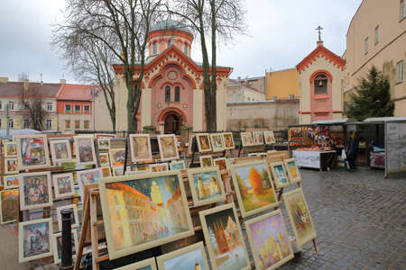 VILNIUS, LITHUANIA - DECEMBER 30, 2016: St Paraskeve Orthodox Church with paintings in the foregroundのeditorial素材