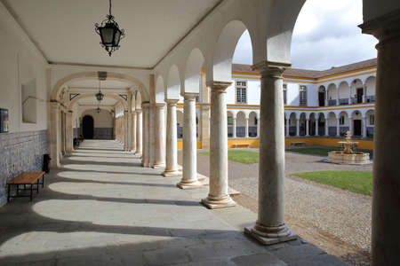 EVORA, PORTUGAL - OCTOBER 11, 2016: The University (Antiga Universidade) with Arcades and marble columnsのeditorial素材