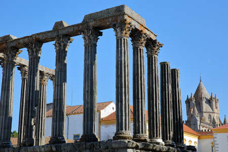 EVORA, PORTUGAL:  Roman ruins of Diana's Temple and The Cathedral in the backgroundの写真素材