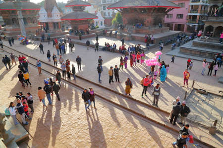 PATAN, NEPAL - DECEMBER 20, 2014: The main street along the temples at sunset at Durbar Squareのeditorial素材