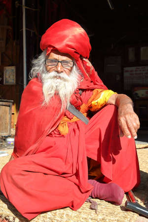 BODHNATH, NEPAL - DECEMBER 24, 2014: Portrait of an old man with a long beard at Ichangu Narayan...