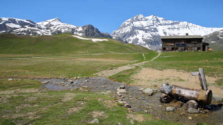 VANOISE, FRANCE - JUNE 23, 2016: Plan-du-Lac refuge with Two summits (Rechasse and Grande Casse) in the background, Northern Alpsのeditorial素材