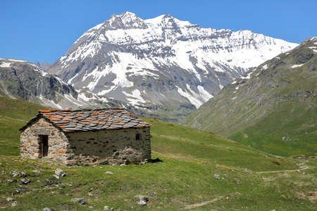 VANOISE, FRANCE: View of Grande Casse from St Barthelemy Chapel near the Plan du Lac refuge,...