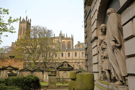 EDINBURGH, SCOTLAND-MAY 6, 2016: the cemetery of St Cuthbert's Church with St John's church in backgroundのeditorial素材