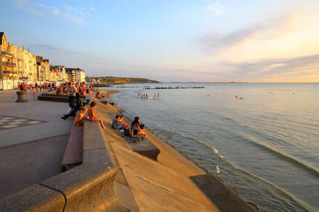 WIMEREUX, FRANCE - AUGUST 26, 2016: The sea front at sunset in Cote d'Opale, Pas-de-Calaisのeditorial素材