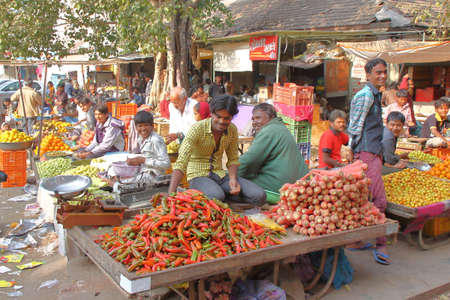 GONDAL, GUJARAT, INDIA - DECEMBER 24, 2013: Welcoming atmosphere in a food marketのeditorial素材