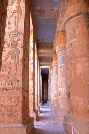 LUXOR, EGYPT: Hieroglyphs and columns at Medinet Habu templeの写真素材