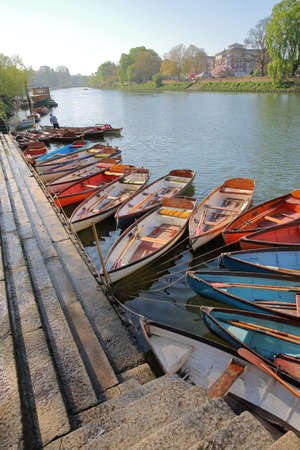 LONDON, UK - APRIL 9, 2017: Colorful boats on the river Thames close to Richmond Bridge in Richmond (Southwest London)のeditorial素材