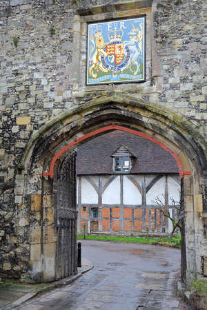 WINCHESTER, UK - FEBRUARY 5, 2017:  The Priory Gate with Coat of Arms at the entrance of the old cityのeditorial素材
