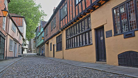NORWICH, UK - JUNE 4, 2017: Elm Hill cobbled street with medieval houses from the Tudor periodのeditorial素材