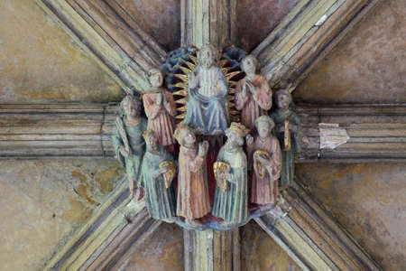 NORWICH, UK - JUNE 3, 2017: Sculpted boss in the ceiling of the Cloister in Norwich Cathedralのeditorial素材