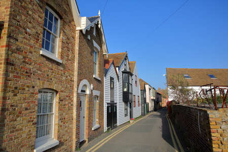 Sea street with traditional houses in Whitstable, UK
