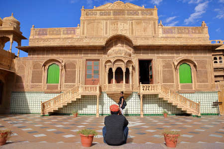 JAISALMER, RAJASTHAN, INDIA - DECEMBER 20, 2017: Jawahir Vilas inside Mandir Palace with patterned pavement and ornate facadeのeditorial素材