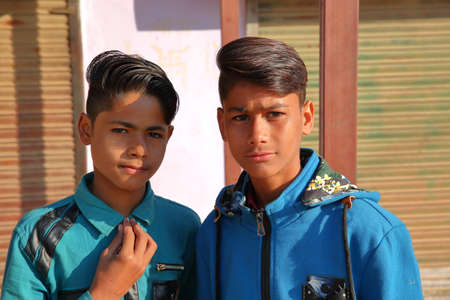 NAWALGARH, RAJASTHAN, INDIA - DECEMBER 25, 2017: Portrait of Two young boys (brothers) posingのeditorial素材