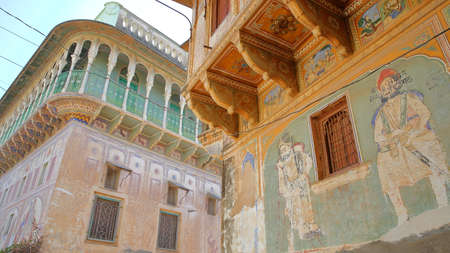 NAWALGARH, RAJASTHAN, INDIA - DECEMBER 25, 2017: Exterior facades of Haveli with colorful paintingsのeditorial素材
