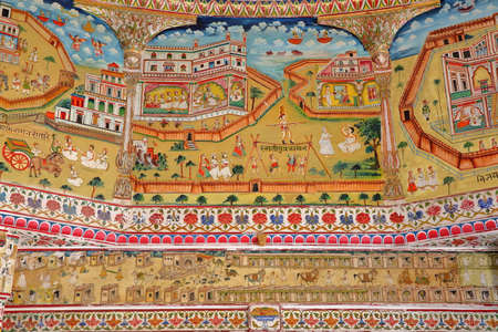 BIKANER, RAJASTHAN, INDIA - DECEMBER 23, 2017: Details of the mural paintings inside  the Jain Bhandasar Temple located in the Old city, depicting palace daily lifeのeditorial素材