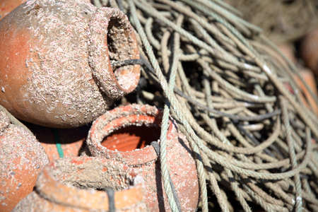 Close-up on Octopus fishing traps (called alcatruz) at Sagres fishing harbor, Algarve, Portugalの写真素材