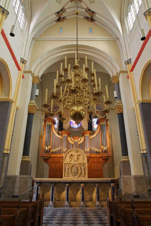MAASTRICHT, NETHERLANDS - AUGUST 03, 2019: The colorful interior of the basilica of Saint Servatius, 11th century Cathedral, with the organのeditorial素材