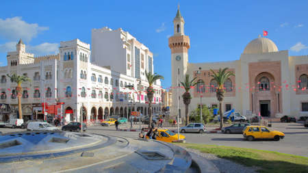 SFAX, TUNISIA - DECEMBER 23, 2019: Human Rights Square, with colonial whitewashed buildings and the town Hall (and archeological museum)のeditorial素材