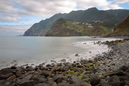 The main beach of Porto da Cruz, located on the North coast of Madeira Island, Portugalの写真素材