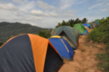 Many people pitch tents in mountain attractions during the extended holiday season.の写真素材
