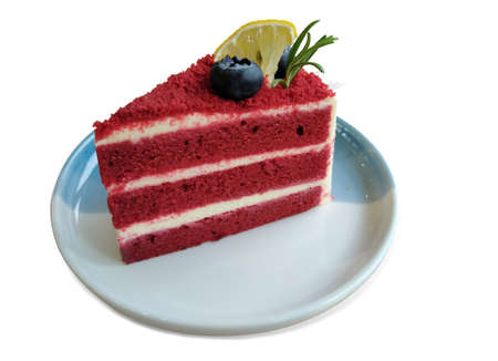 Red velvet cake on the plate isolated white backgroundの写真素材