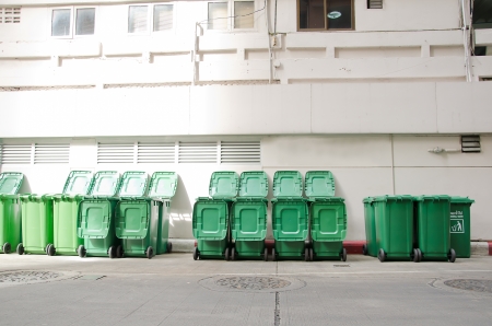 large green trash cans  garbage bin  with wheelsの写真素材